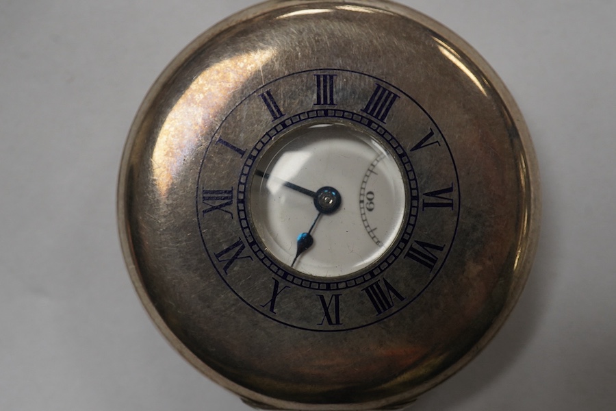 A George V silver J.W. Benson keyless half hunter pocket watch, with Roman dial and subsidiary seconds, case diameter 49mm. Condition - poor to fair